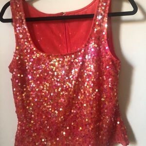 Tadashes neckline in front , zipper in back, L- 20” , Chest 16 -17 “, waist -15”